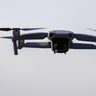 Taking aerial photos to survey Hirizohama and the surrounding islets and waters.The drone is flown with permission from the local fishing cooperative. 