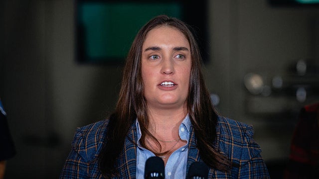 ICE Deputy Director Madison Sheahan speaks during a press conference with Homeland Security Secretary Kristi Noem in Gary, Indiana, on Oct. 30, 2025. 
