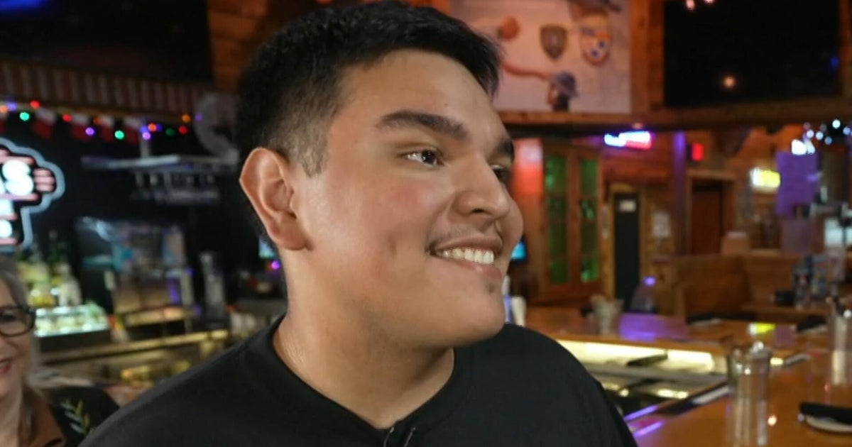 Young worker rescues couple from burning car and is later surprised with EMT scholarship