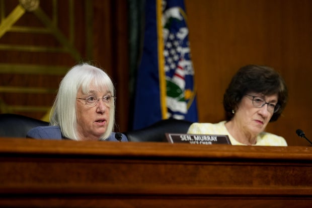 Sen. Patty Murray, a Democrat from Washington and ranking member of the Senate Appropriations Committee, left, and Sen. Susan Collins, a Republican from Maine and chair of the Senate Appropriations Committee, during a hearing on June 25, 2025. 