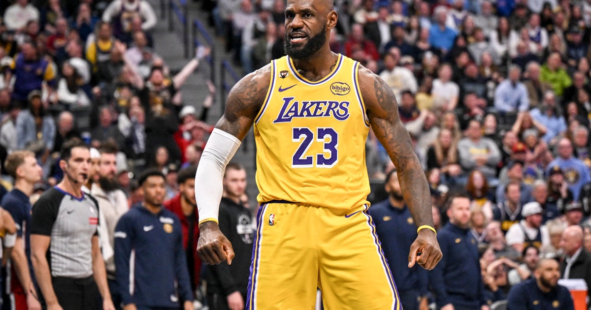 Doncic has a triple-double as the Lakers rally past the short-handed ...