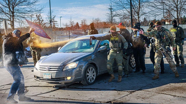 TOPSHOT-US-IMMIGRATION-ICE-SHOOTING 