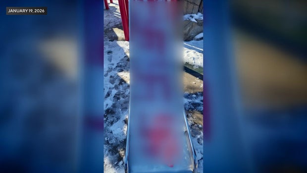 Swastikas painted on a slide