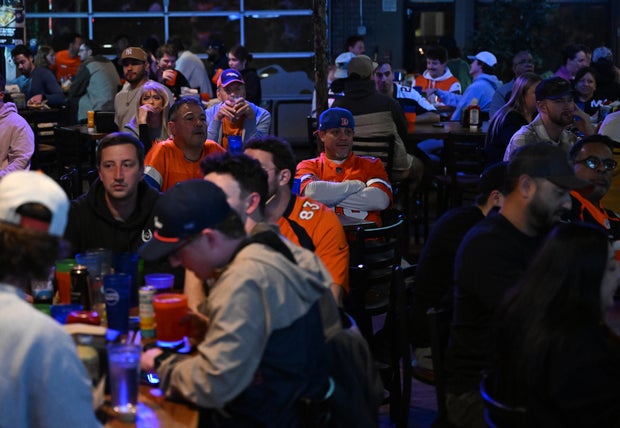 Fan watch the Denver Broncos play the Las Vegas Raiders 