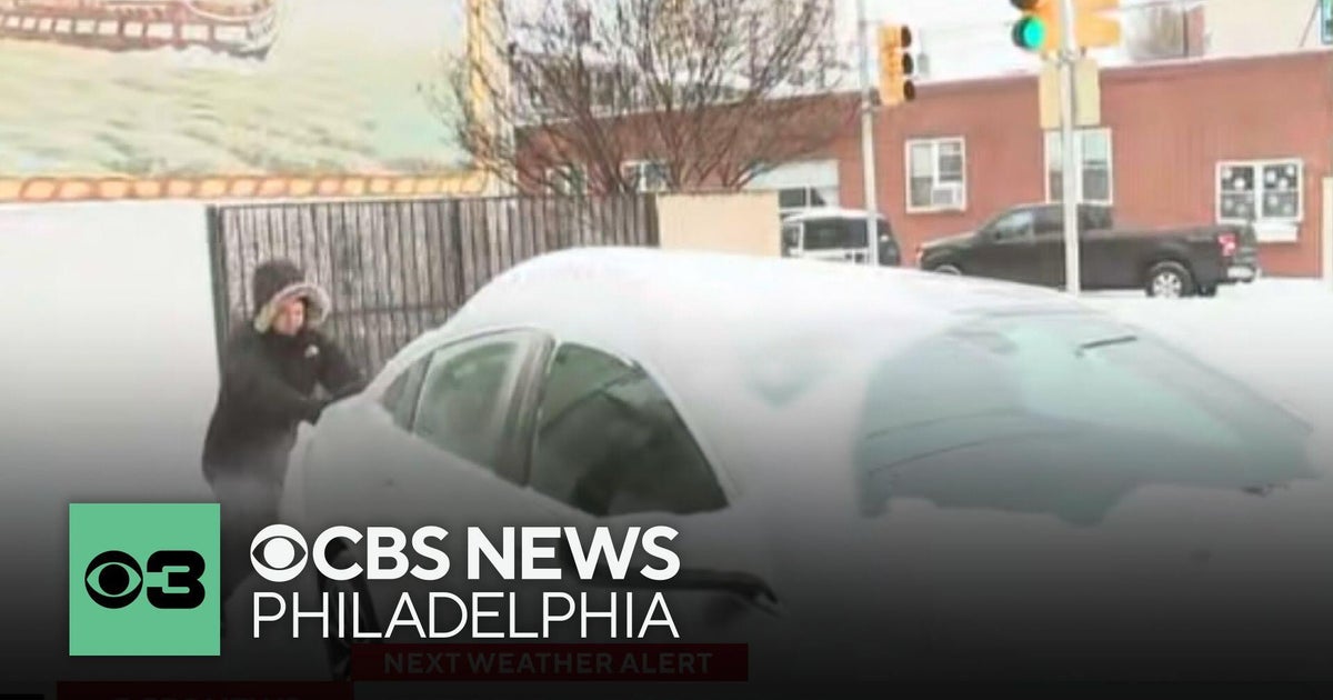 CBS News Philadelphia reporter helps push car stuck in South Philly snow