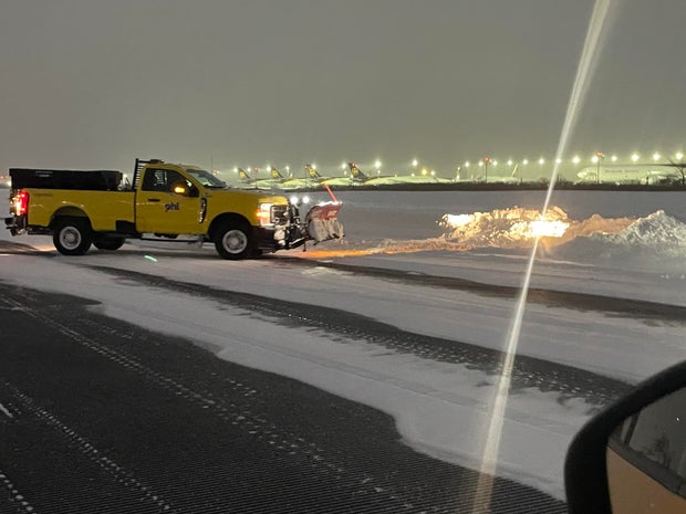 Crews clear the runways at Philadelphia International Airport