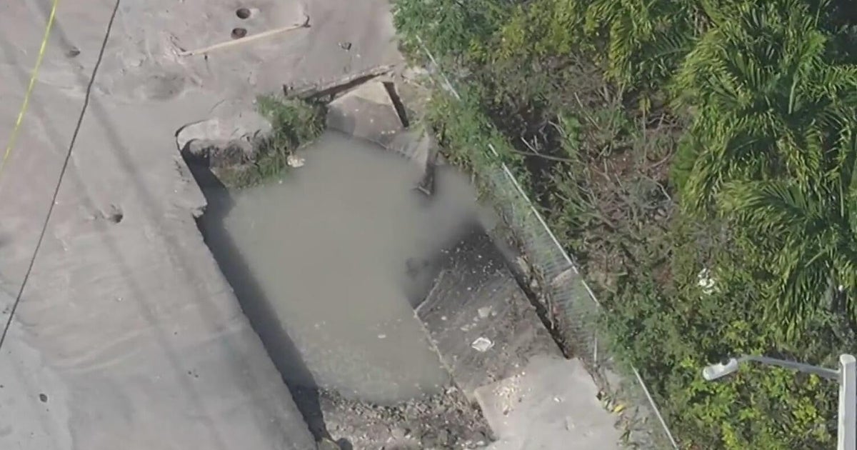 Massive sinkhole opens near BSO headquarters after truck hits hydrant