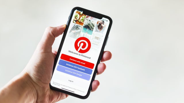 Apple iPhone XR showing homepage Pinterest application on mobile 