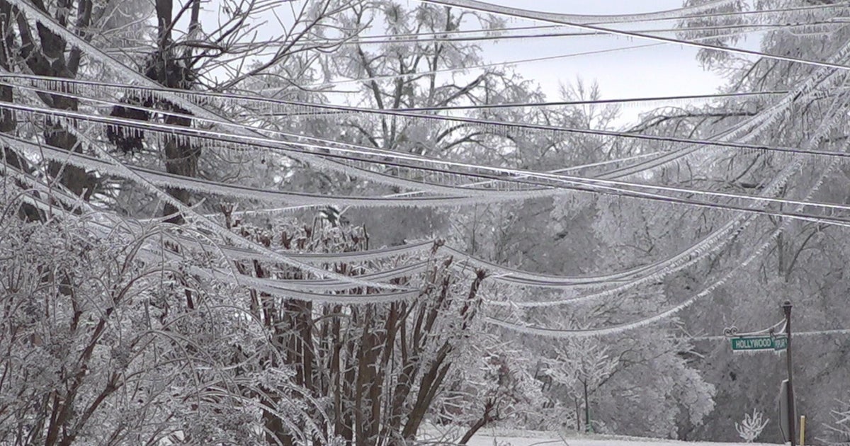 Power out for hundreds of thousands, roadways snarled with ice and snow