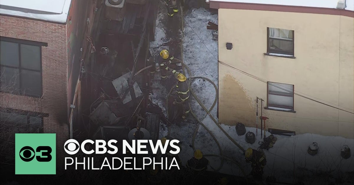 Fire crews remove propane tanks from area after blaze in Roxborough section of Philadelphia