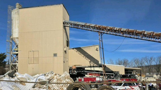 Worker trapped in Baltimore County sand hopper; rescue underway
