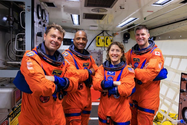 The Artemis II crew, from left: Commander Reid Wiseman, pilot Victor Glover, astronaut Christina Koch and Canadian astronaut Jeremy Hansen. If all goes well, the crew will blast off atop NASA's second Space Launch System rocket on Feb. 8, 2026, for a nine-day flight around the moon and back. 