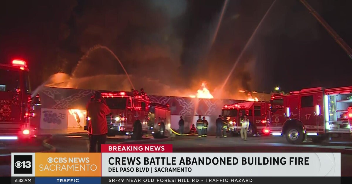 Crews battle fire at abandoned bank in Sacramento