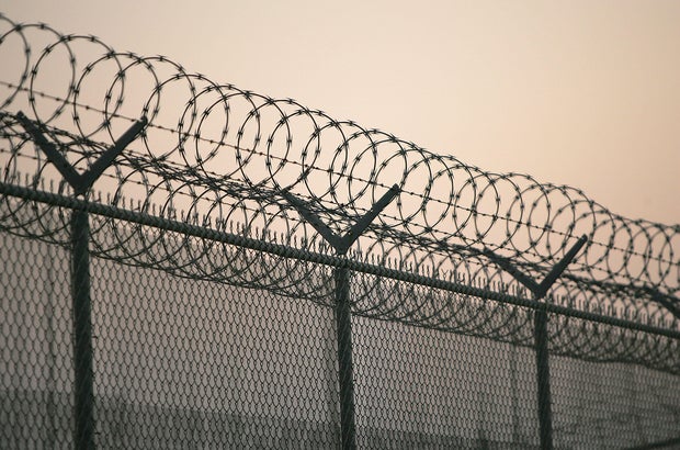 Jail Prison detention center barbed wire cell