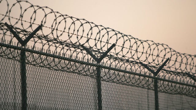 Jail Prison detention center barbed wire cell 