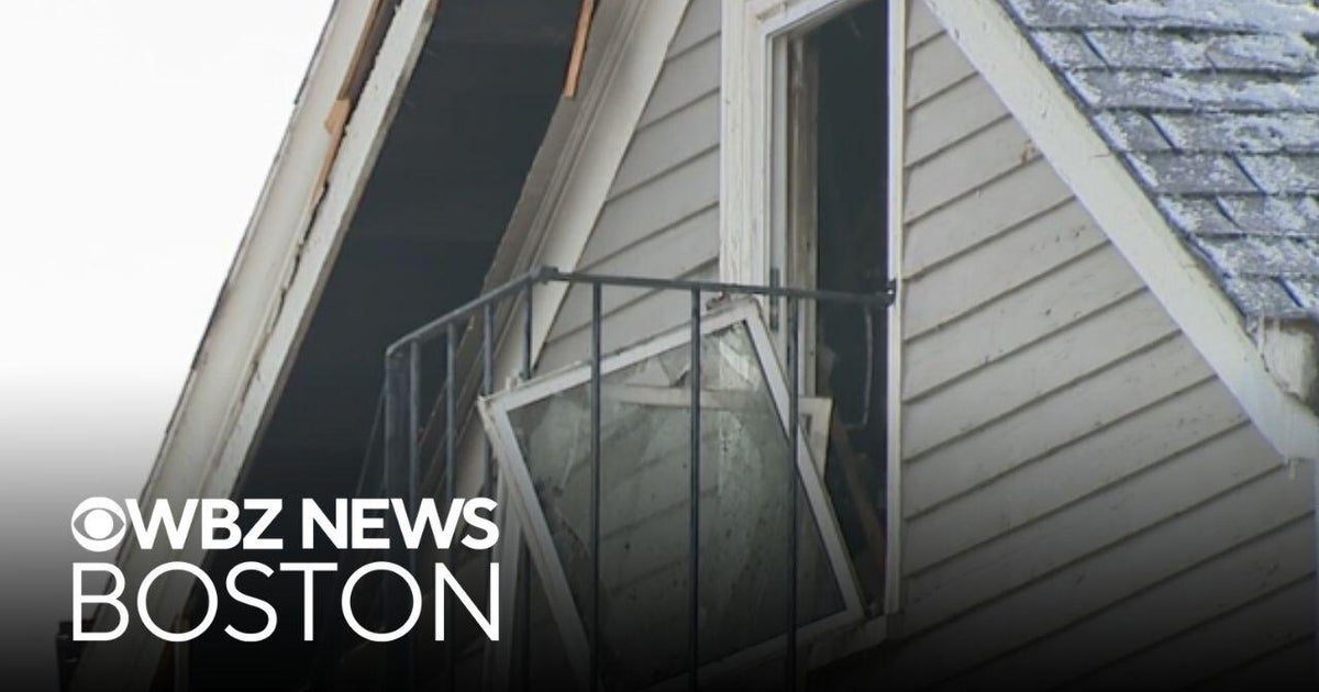 Large fire rips through 2-family home in Brookline, Massachusetts