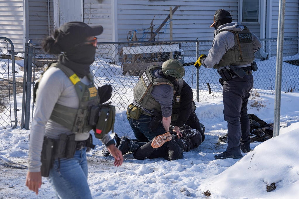 Federal immigration agents draw guns, arrest activists who were ...