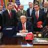 President Trump speaks to the press before signing a funding bill in the Oval Office of the White House in Washington, D.C., on Feb. 3, 2026. 