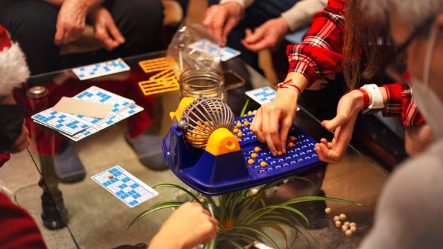 Friends sharing a board game together 