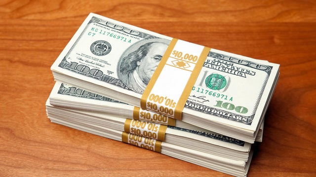 $40,000 in US $100 Bills Bundled on Cherry Wood 