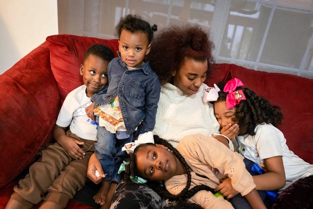 Ayanna Mizani Harris-Rashid is pictured with her children 