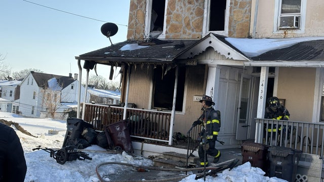 A photo of a Wilmington home damaged in a fire, the adjoining house is also moderately damaged 