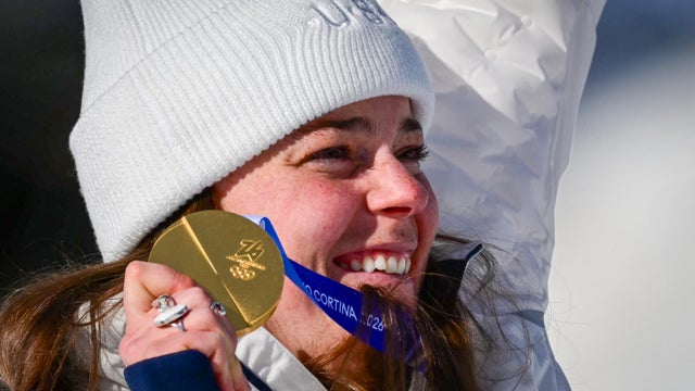 Breezy Johnson with her Olympic gold medal 