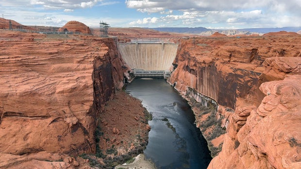 Massive Glen Canyon Dam Surrounded by Red Rock Cliffs - Page, Arizona - USA