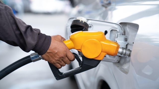 Fill up your car with fuel at the service station 