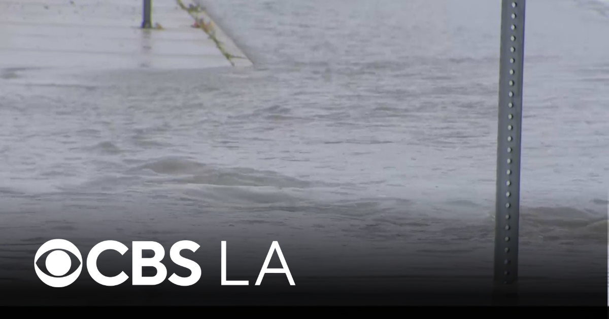 Rain flood Los Angeles County streets and create traffic nightmare for drivers