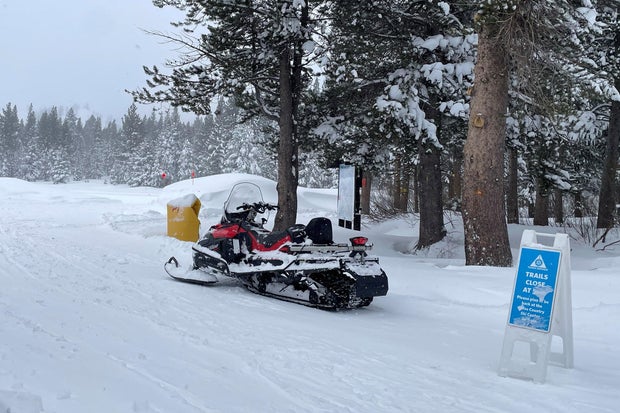 Rescue teams deploy to the tract  of an avalanche successful  a backcountry slope of California's Sierra Nevada mountains 