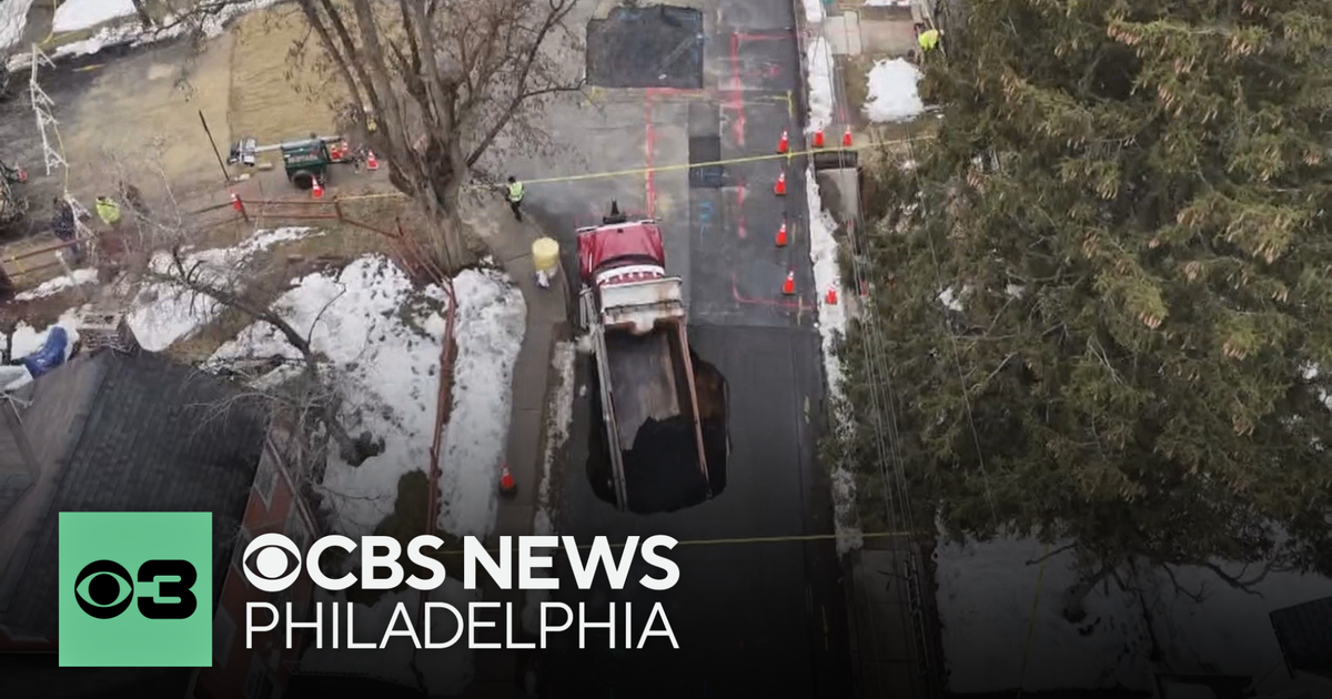 Massive sinkhole swallows dump truck in New Jersey