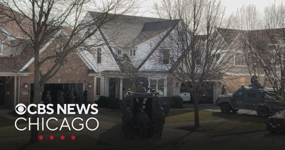 Man in custody after home invasion, all day standoff with Arlington ...