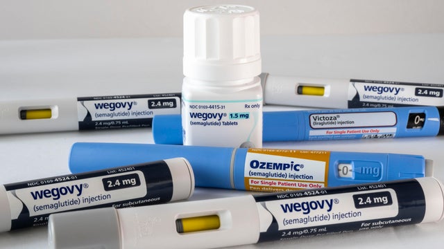 Wegovy tablets with injectable prescription weight loss medicines, Ozempic, Victoza and Wegovy on a white background 