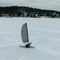 Setting sail on iceboats across a frozen lake in Wisconsin