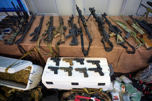 Weapons that Cuban authorities say were recovered from a speedboat in Cuban waters following a deadly confrontation are displayed in Havana, Feb. 27, 2026. 
