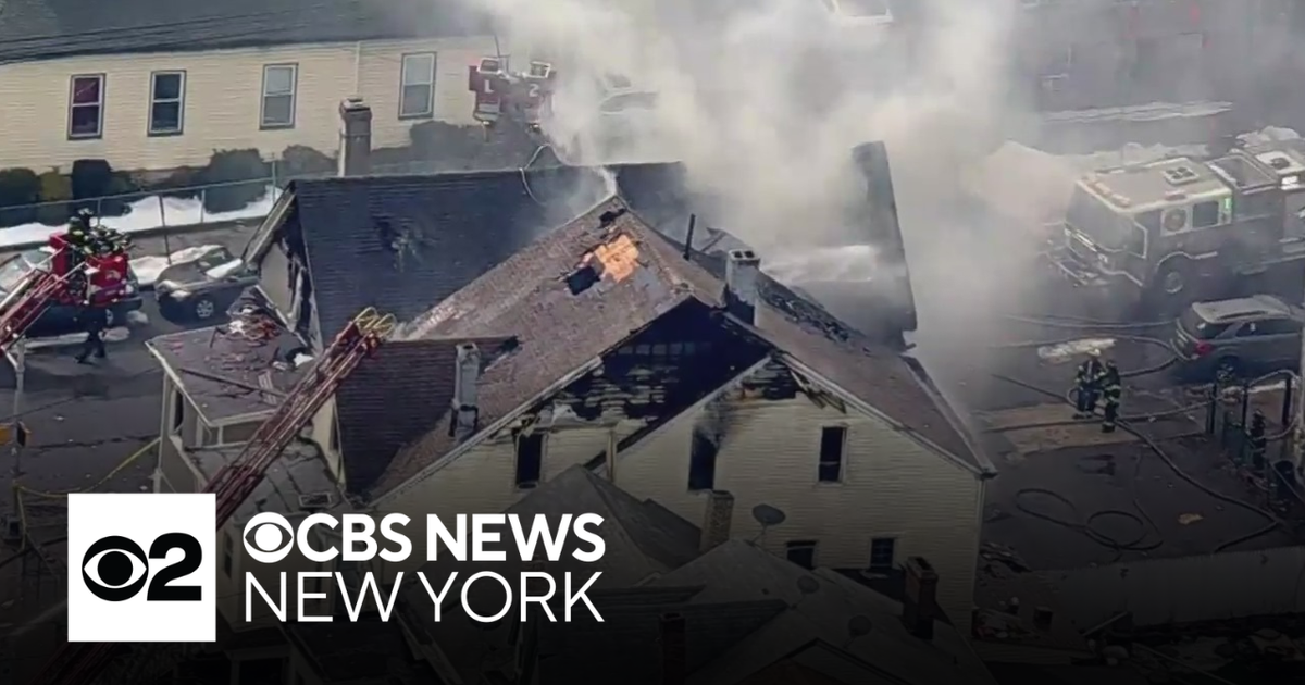 Fire burns through house in New Jersey town - CBS New York