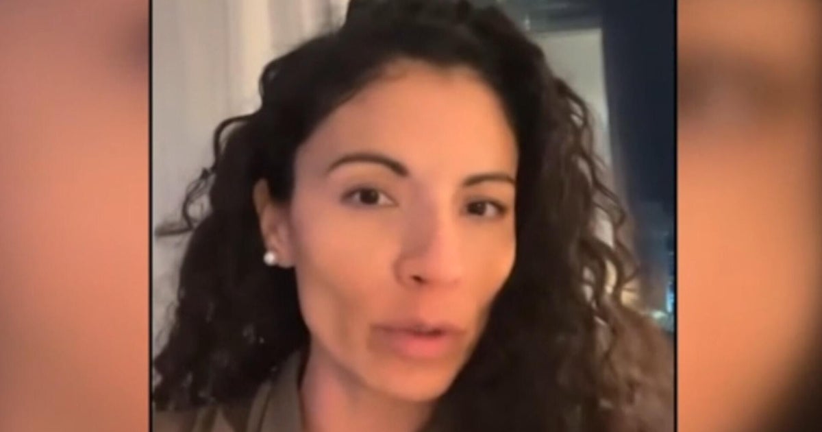 American stranded in Qatar says she missed grandfather's funeral and U.S. isn't helping