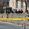 Suspect linked to U.S. consulate shooting on run in Canada, officer killed