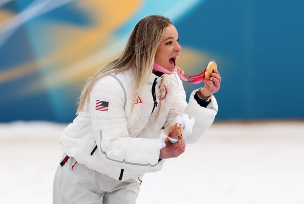 Oksana Masters of Team USA celebrates during the medal ceremony for the Para cross-country skiing women's sprint sitting at the Paralympics, March 10, 2026, in Val di Fiemme, Italy. 