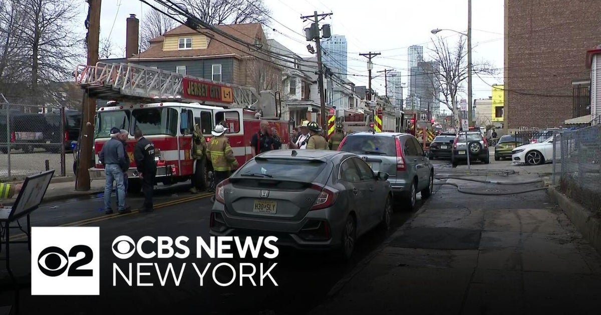 Firefighter, 4 others hurt in Jersey City house fire - CBS New York