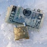 Frozen dollars with padlock 