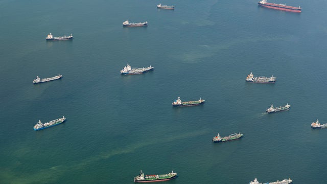 Cargo ships oil tankers at sea, Singapore Strait 