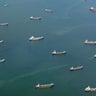 Cargo ships oil tankers at sea, Singapore Strait 
