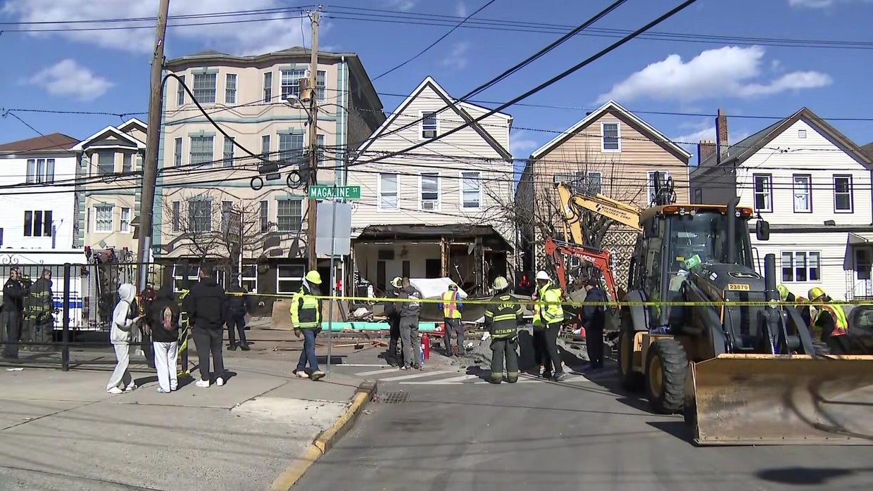 4 hurt in Newark when gas explosion tears facade off home - CBS New York