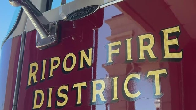 The side of a firetruck with the words Ripon Fire District printed on them 