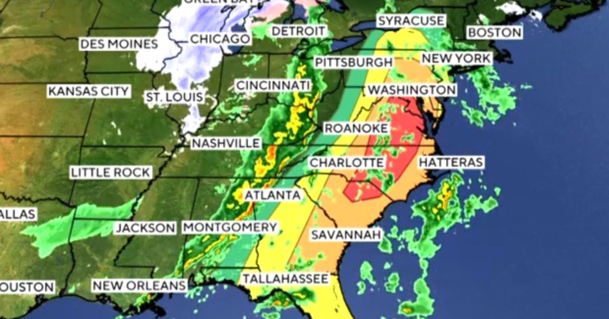 Snow slams parts of the Midwest as the East Coast braces for severe storms