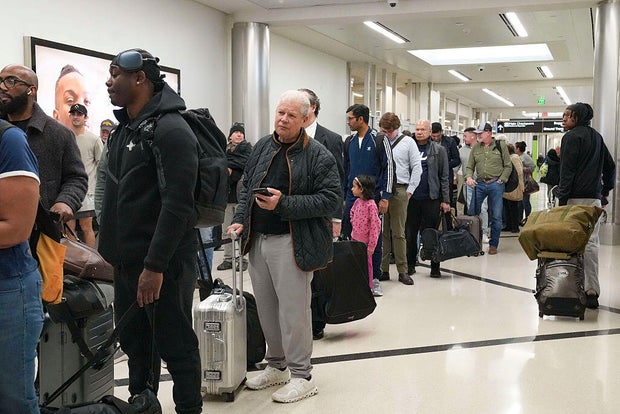 DHS Shutdown Combined With Large Disruptive Weather System Creates Long Lines At Atlanta Airport 