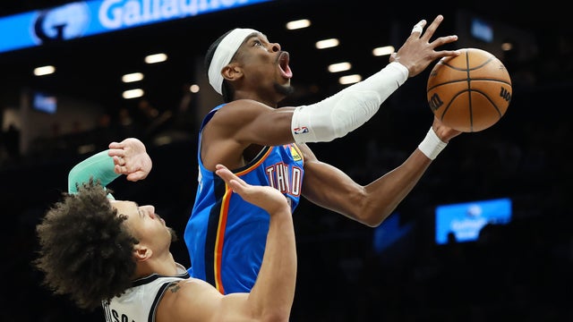 Shai Gilgeous-Alexander #2 of the Oklahoma City Thunder goes to the basket as Jalen Wilson #22 of the Brooklyn Nets defends during the first half at Barclays Center on March 18, 2026 in the Brooklyn borough of New York City. 
