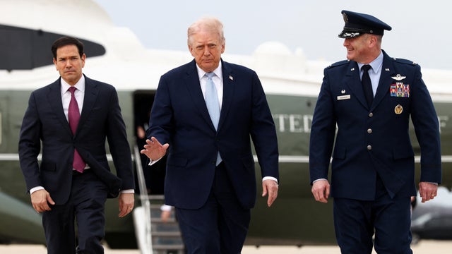 President Trump walks with Secretary of State Marco Rubio 